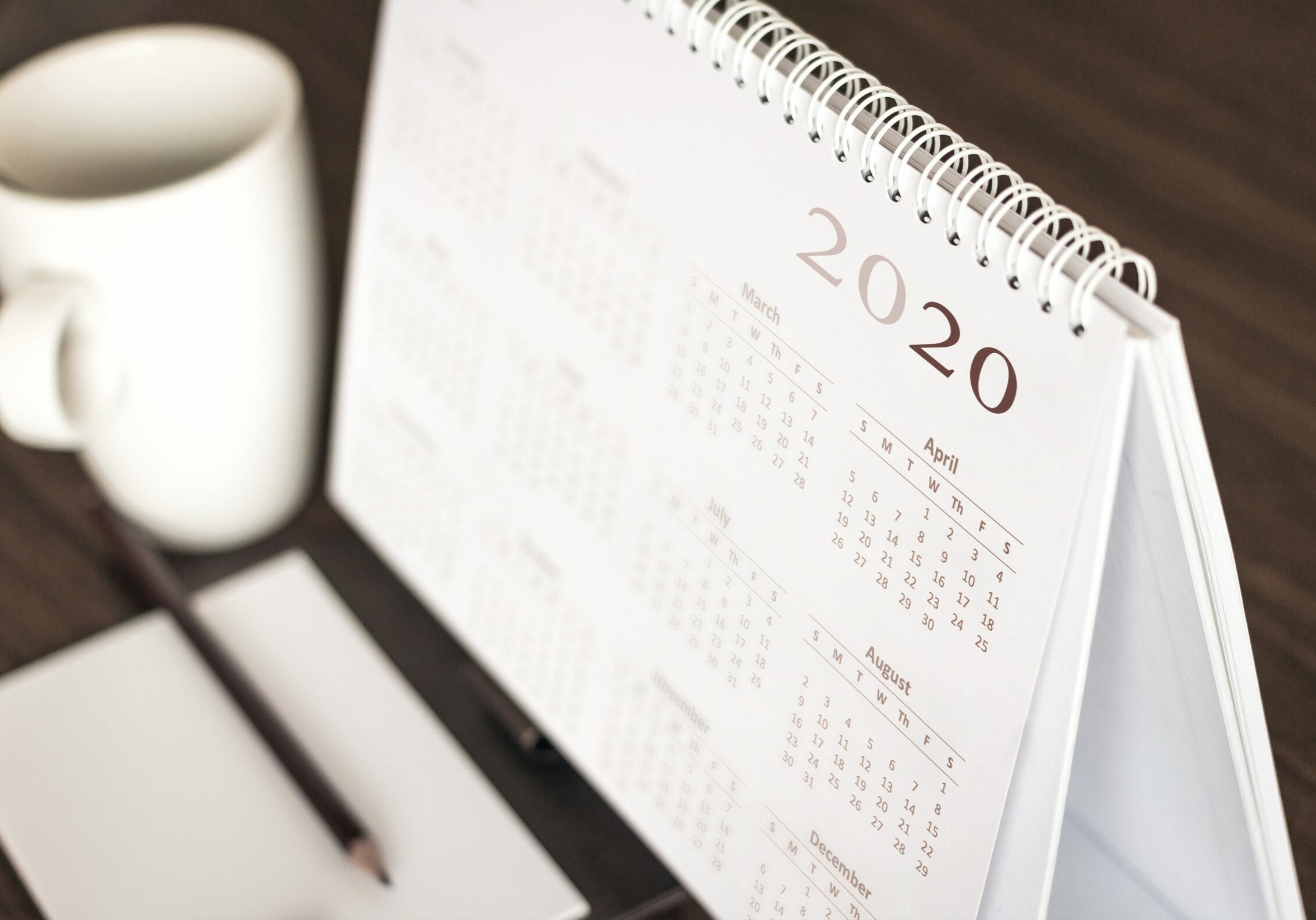 Desktop calendar sitting on desk showing year of 2019